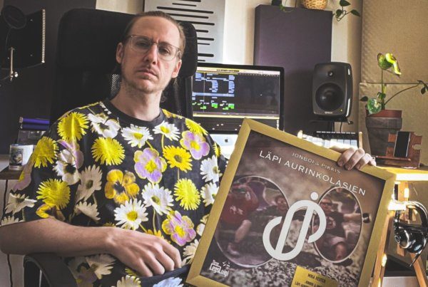 Mika Reuter holding gold record