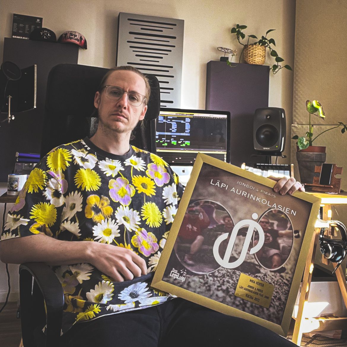 Mika Reuter holding gold record