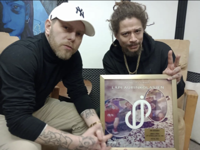 Pikkis & Juno holding gold record